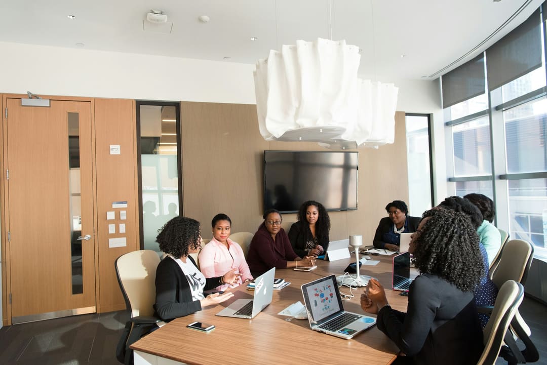 A senior leadership team in strategic discussion